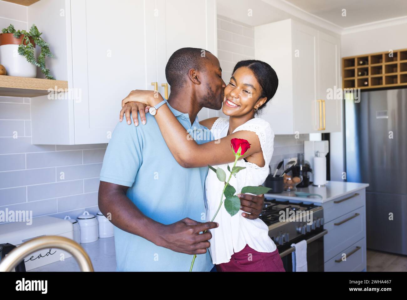 Woman kisses man hi-res stock photography and images - Alamy