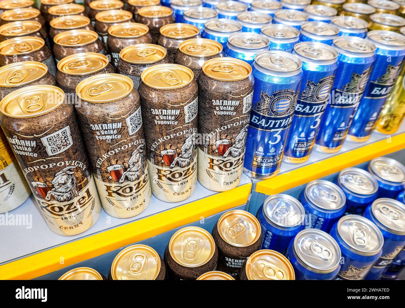 Samara, Russia - May 13, 2023: Various alcoholic canned beer on the shelf in a superstore. Canned alcoholic beverages and spirit drinks. Selective foc Stock Photo
