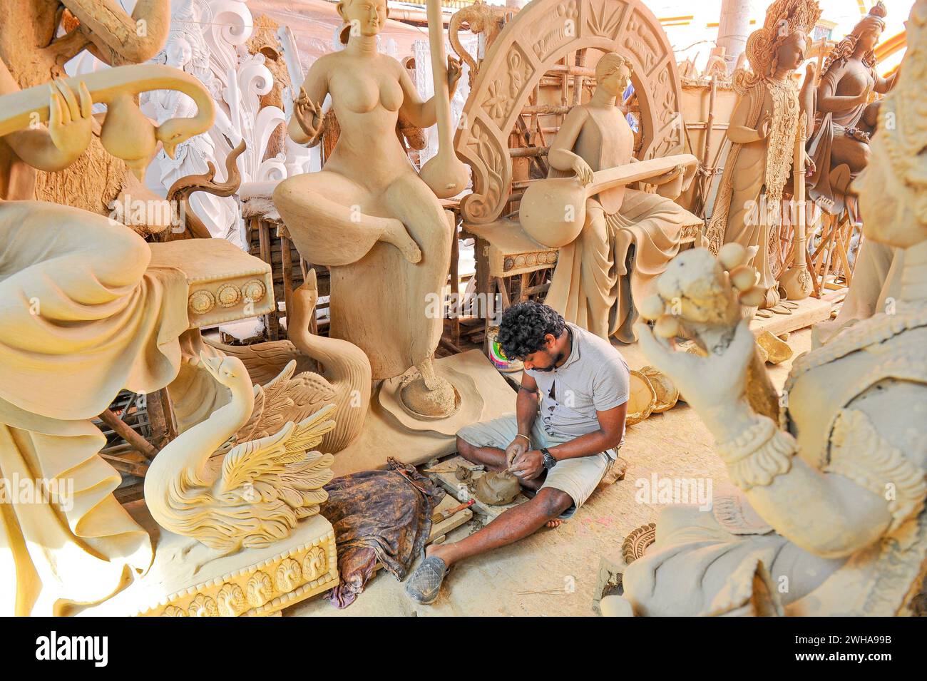 Preparations For Saraswati Puja Festival 2024 February 8, 2024, Sylhet, Bangladesh: An idol artist is works on a sculpture of Goddess Saraswati for the upcoming Saraswati Puja. Saraswati Goddess is intimately related to knowledge, education, and learning. Sylhet Bangladesh Copyright: xMdxRafayatxHaquexKhanxxEyepixxGrx Stock Photo