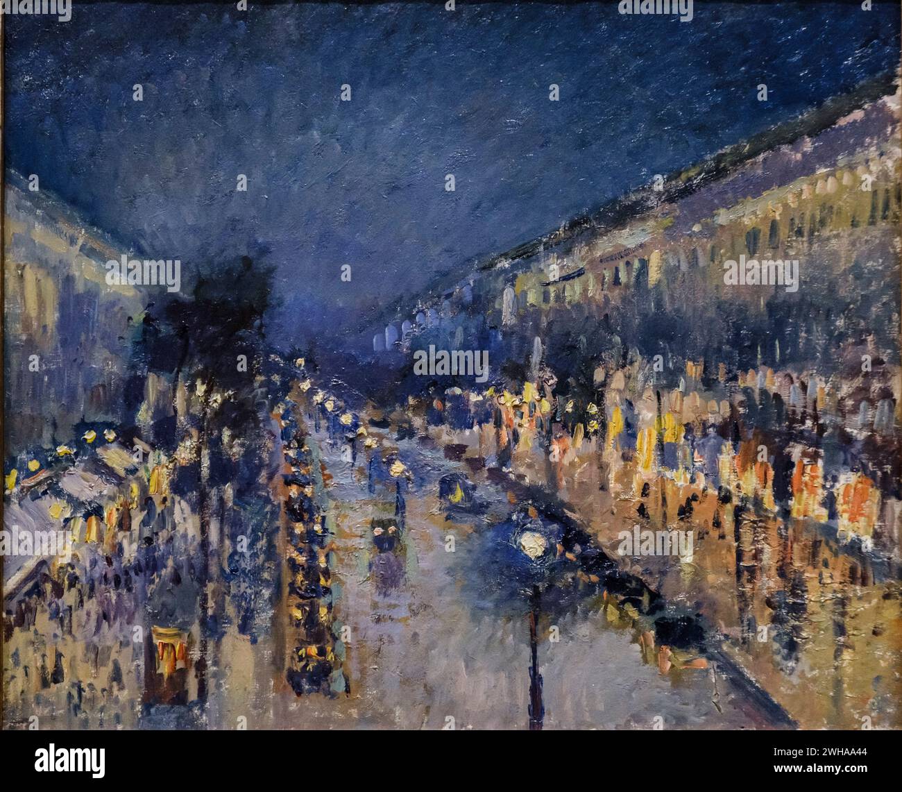 Boulevard Montmartre at Night, Camille Pissarro, 1897, oil on canvas, National Gallery, London, England, Great Britain Stock Photo