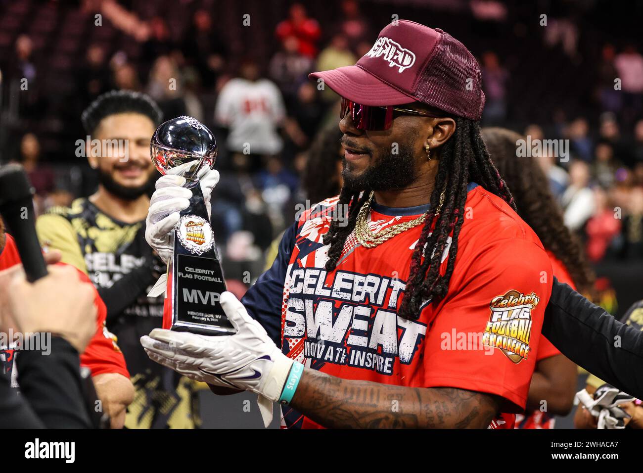 Henderson, NV, USA. 08th Feb, 2024. NFL player Alexander Mattison poses with the MVP trophy at the conclusion of the 24th annual Celebrity Flag Football Challenge at the Dollar Loan Center in Henderson, NV. Christopher Trim/CSM/Alamy Live News Stock Photo