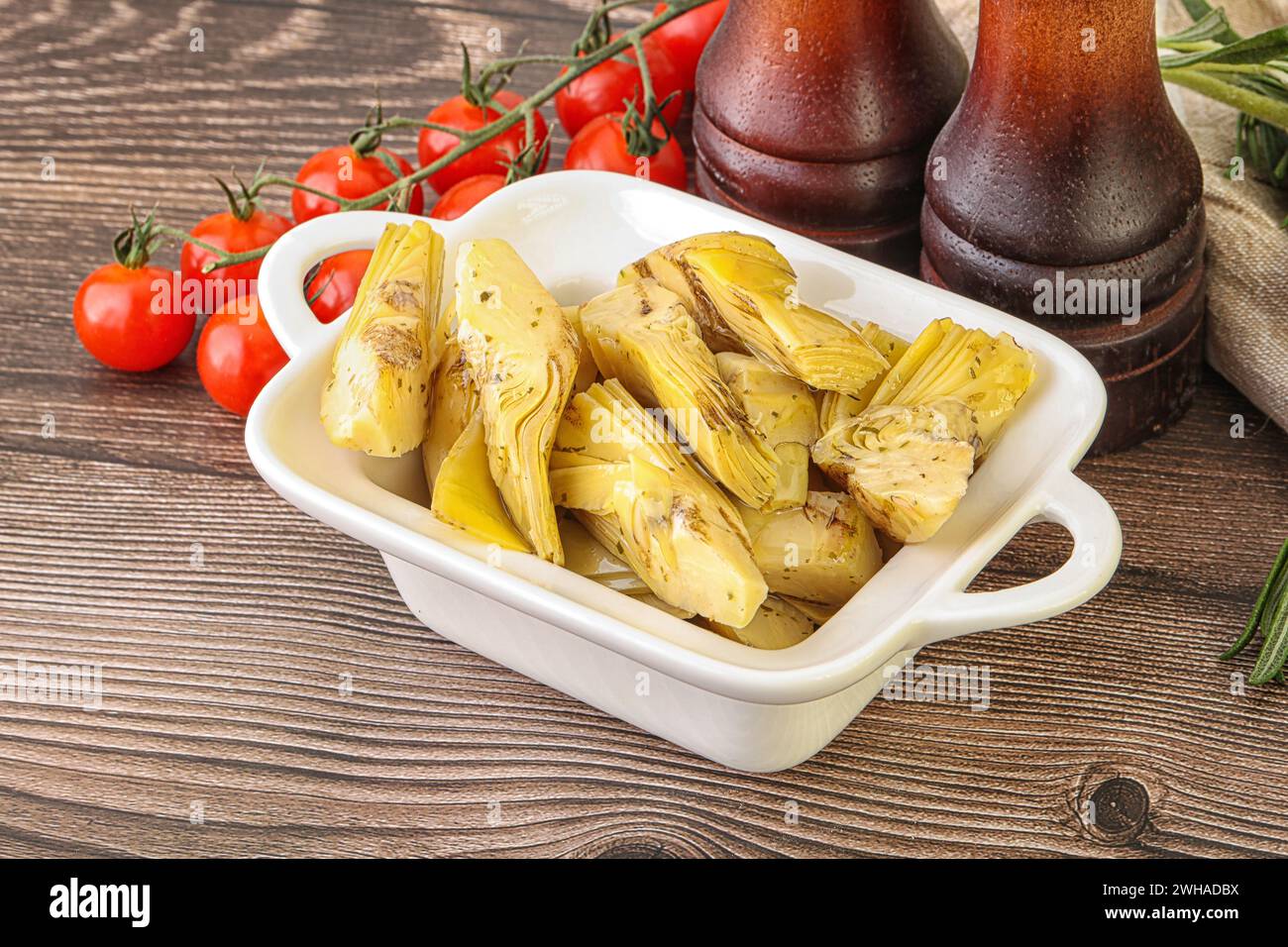 Grilled artichoke marinated in olive oil Stock Photo Alamy