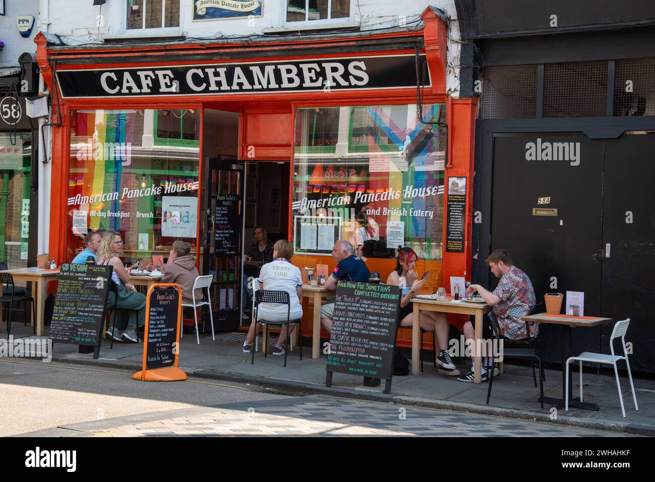 People relaxing at the coffee shops in the streets of Canterbury
