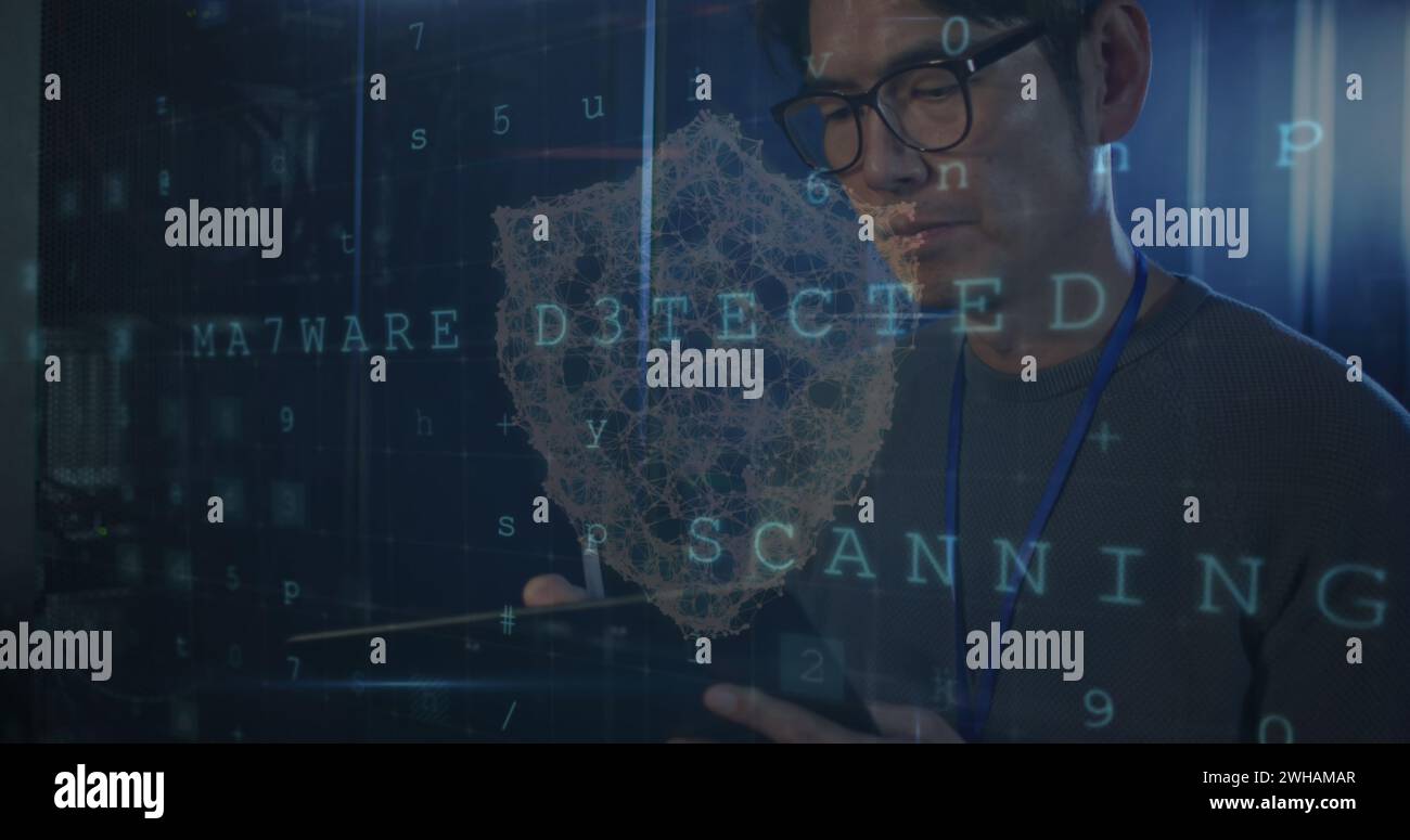 Image of data processing over asian male worker in server room Stock Photo