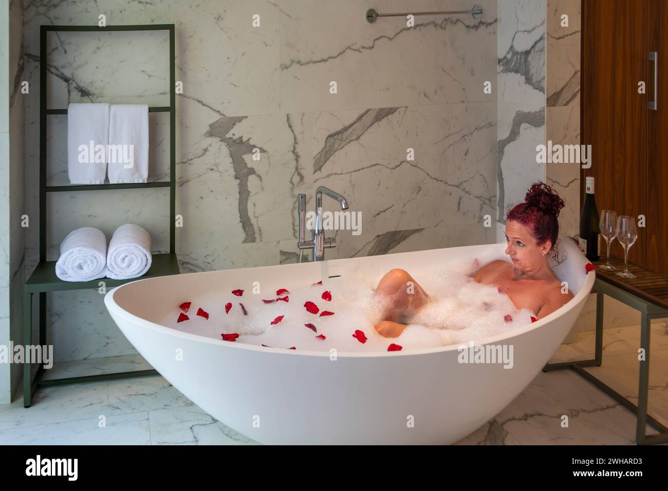 Relaxing woman in bathtub hi-res stock photography and images - Alamy