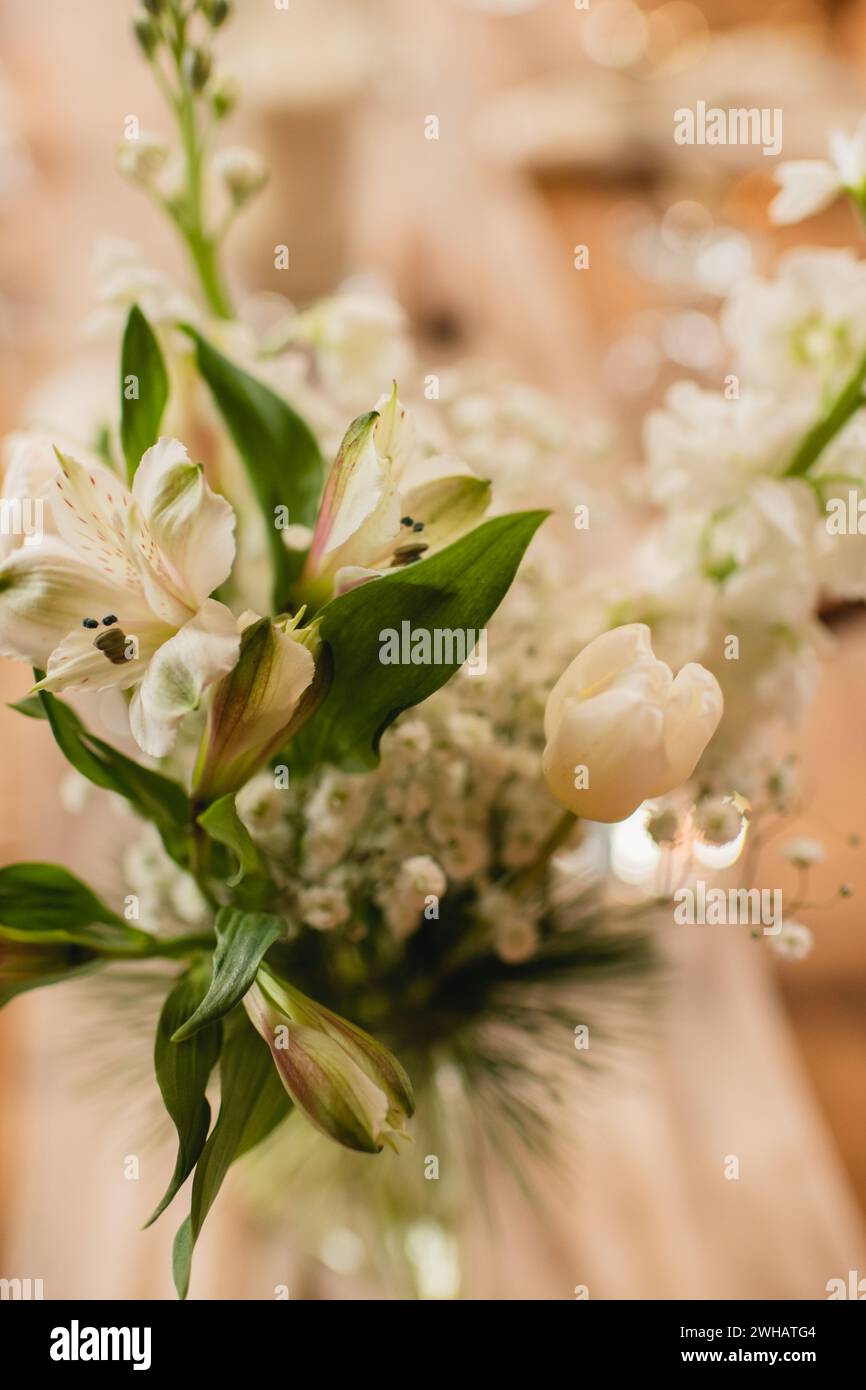Top view of elegant floral bouquet with tulips, baby's breath & lilies ...