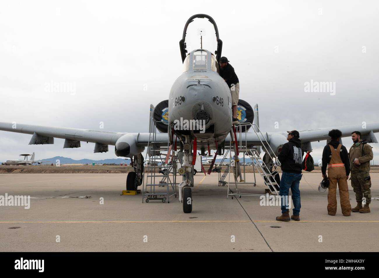 An A-10C Thunderbolt II aircraft is examined at Davis-Monthan Air Force Base, Ariz., Feb. 6, 2024. Photo by Robert Allen Cooke III Stock Photo