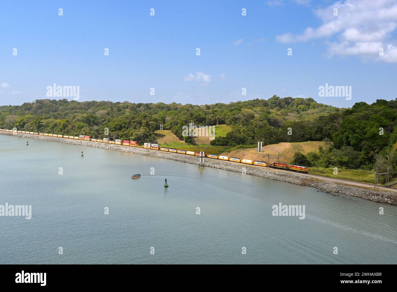 Panama 22 January 2024 Diesel Locomotives Pulling A Freight Train Of   Panama 22 January 2024 Diesel Locomotives Pulling A Freight Train Of Wagions Carrying Shipping Containers On The Panama Canal Railway 2WHAXBR 