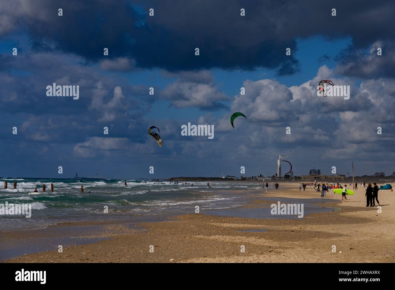 watersports enthusiasts with various form of surfing and sailing Photographed at the beach of Beit Yanai, Israel Beit Yanai is a moshav in central Isr Stock Photo