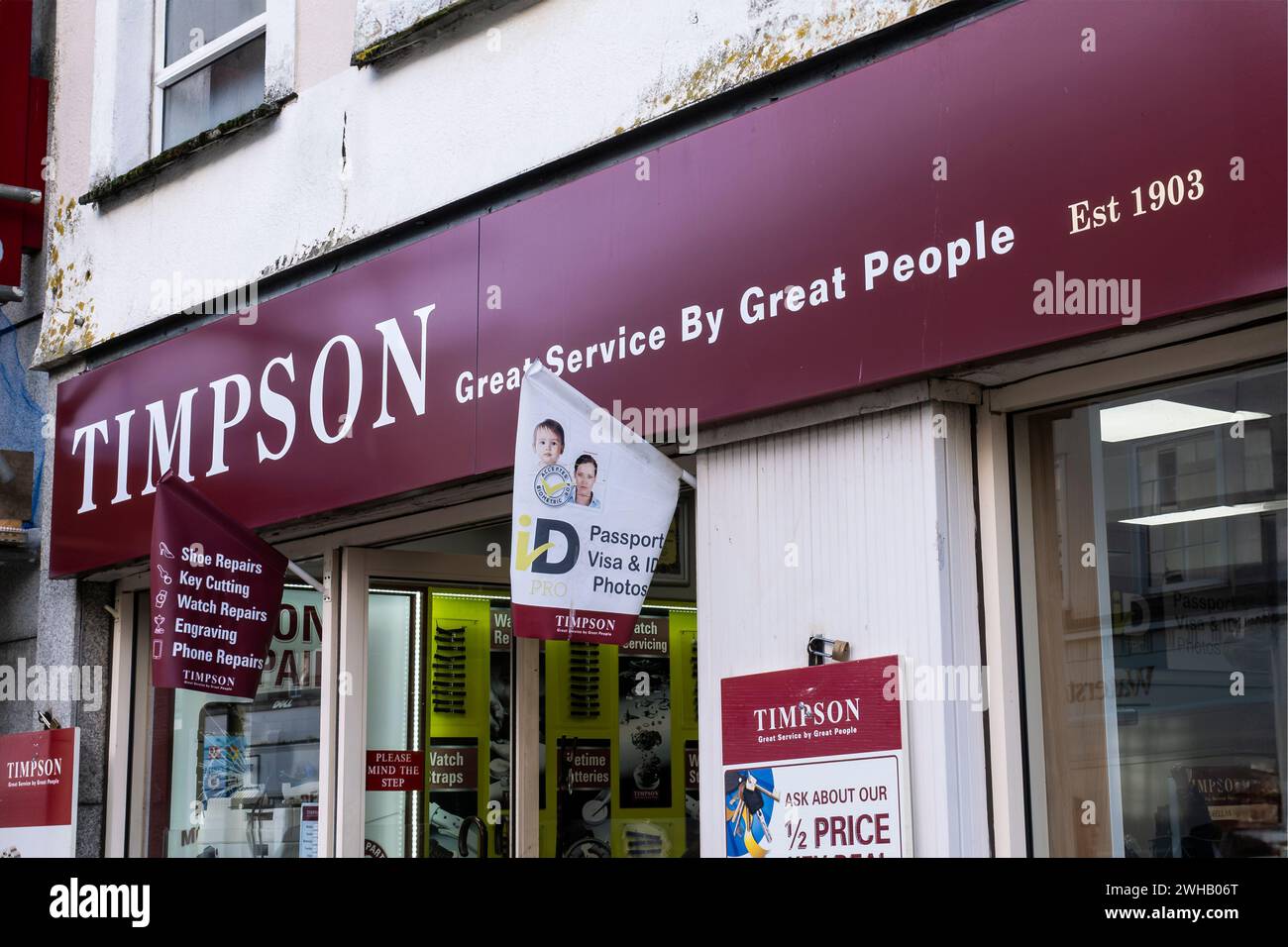 A shop sign for Timpsons in Truro City centre in Cornwall, UK Stock Photo