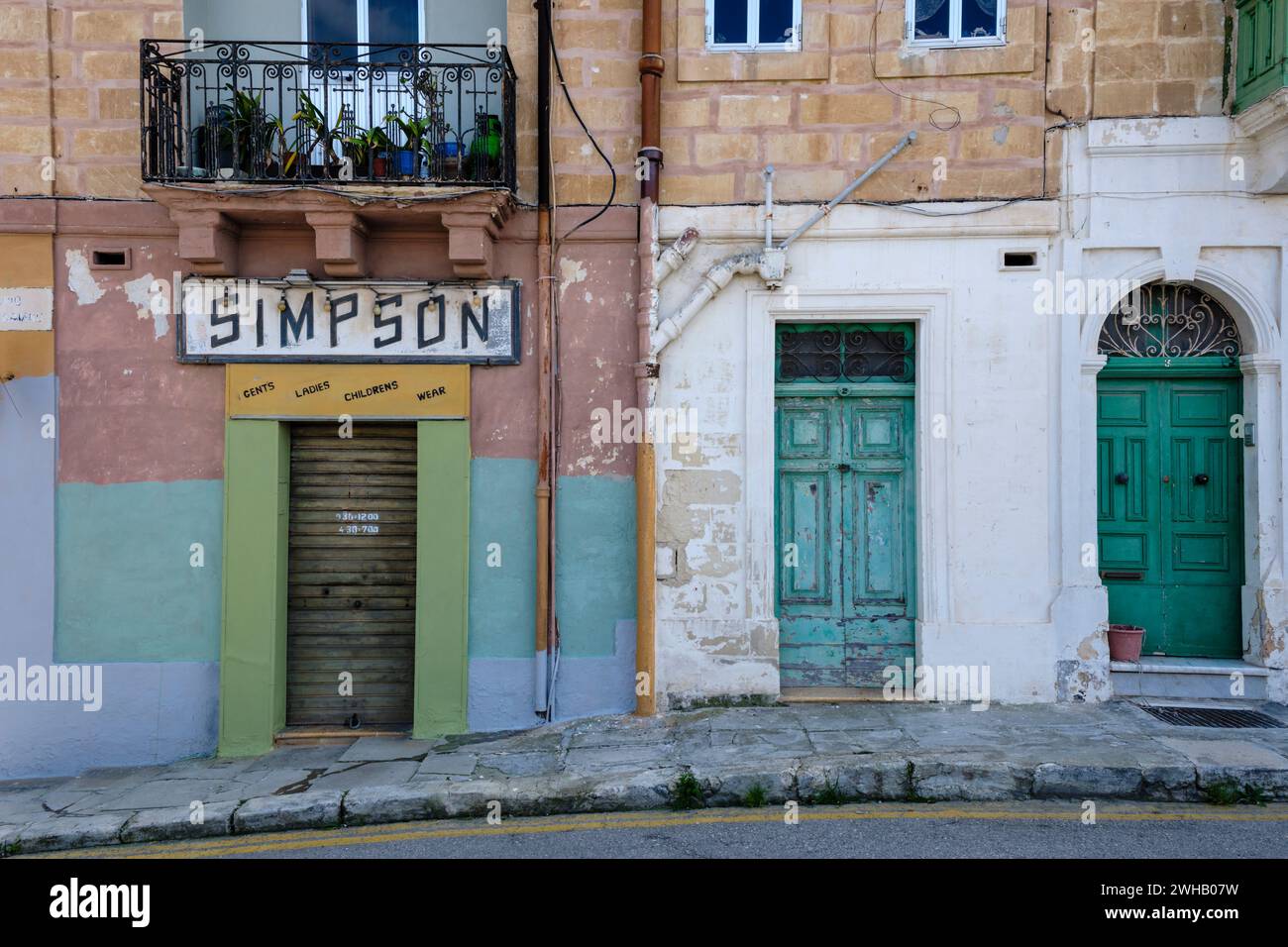 A closed clothes shop in  Senglea, The Three Cities, Valletta, Malta Stock Photo