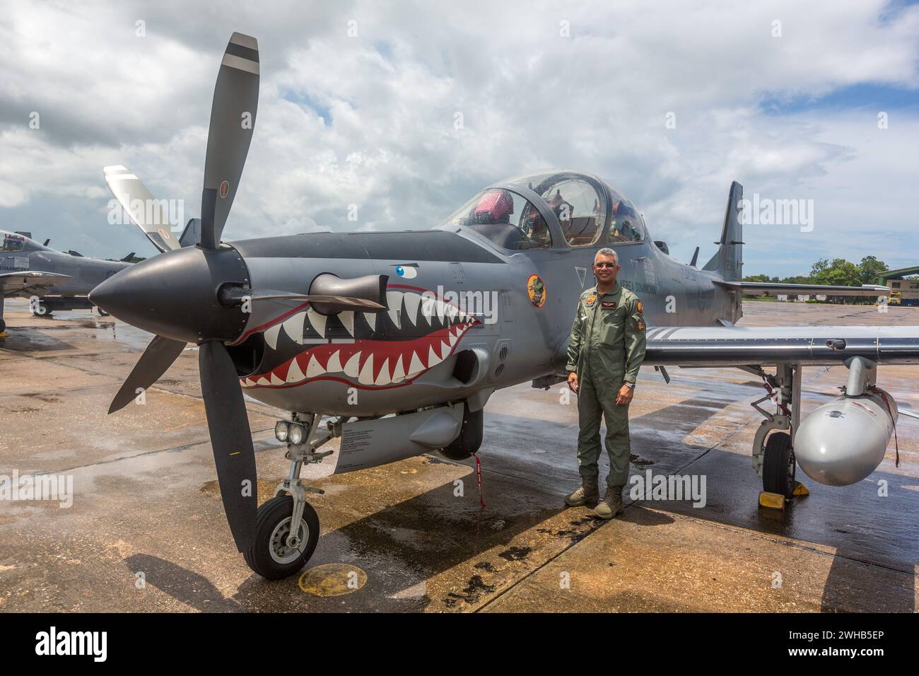 A Dominican Air Force pilot by a Super Tucano fighter aircraft at the San Isidro Air Base in the Dominican Republic. Stock Photo