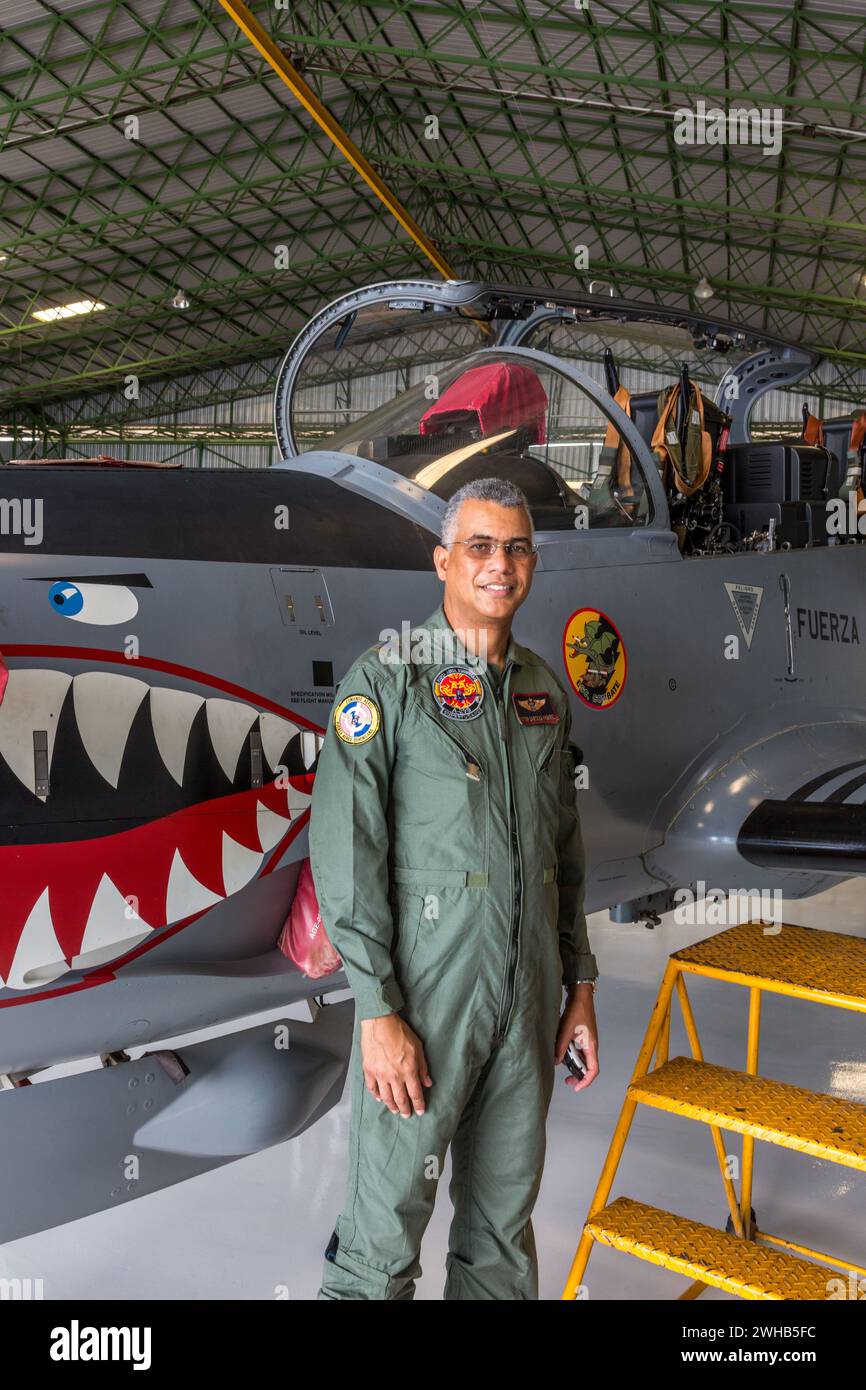 A Dominican Air Force pilot by a Super Tucano fighter aircraft at the San Isidro Air Base in the Dominican Republic. Stock Photo