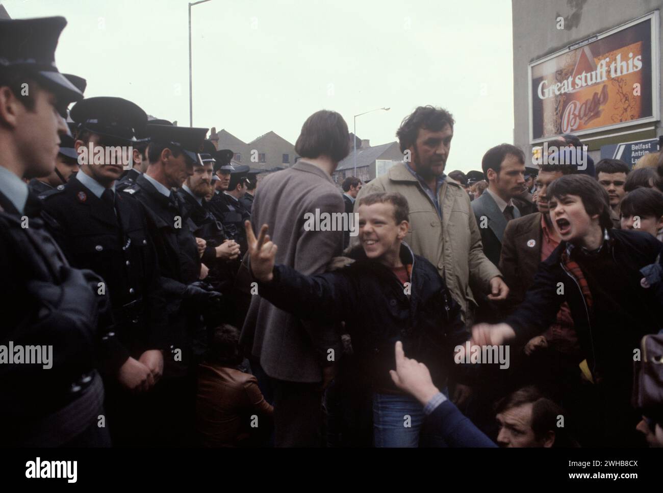 V sign, two finger salute teenage boys vent their anger on passive RUC ...