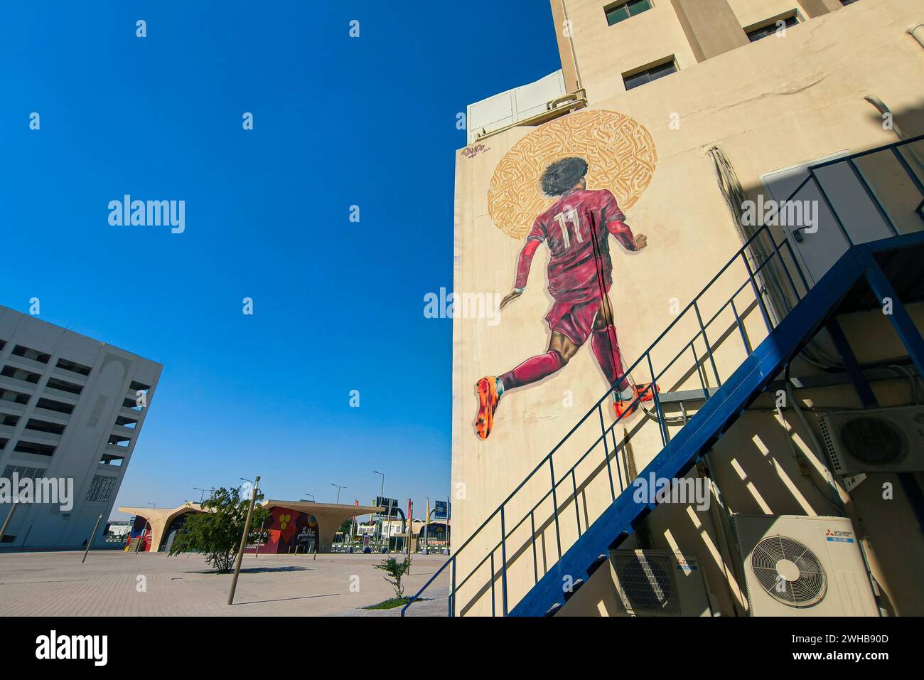 Doha, Qatar. 9 February, 2024. The murals of Brazilian football star Ronaldo and Qatar football star Akram Afif are seen in the streets of Al Bidda during the AFC Asian Cup. Credit: Meng Gao/Alamy Live News Stock Photo