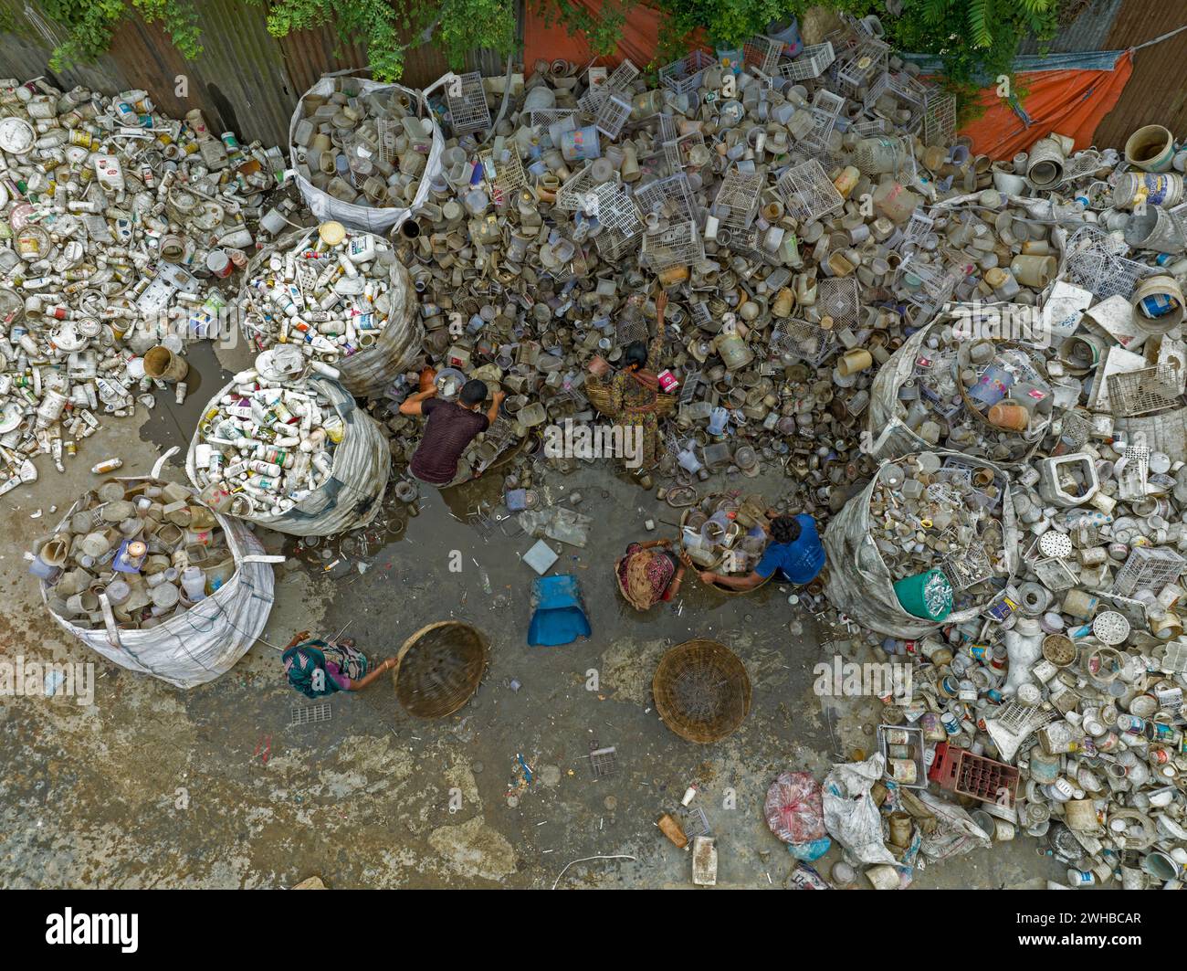 Aerial view of a people working in a plastic recycle Waste treatment plant in Brahmanbaria, Bangladesh. Stock Photo