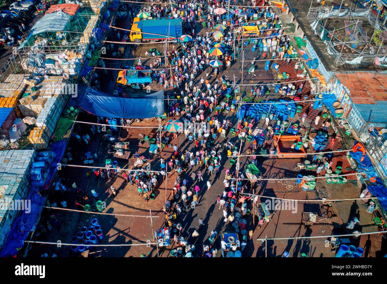 Aerial view of people working and trading at fish market along Karnaphuli river, Chittagong, Bangladesh. Stock Photo