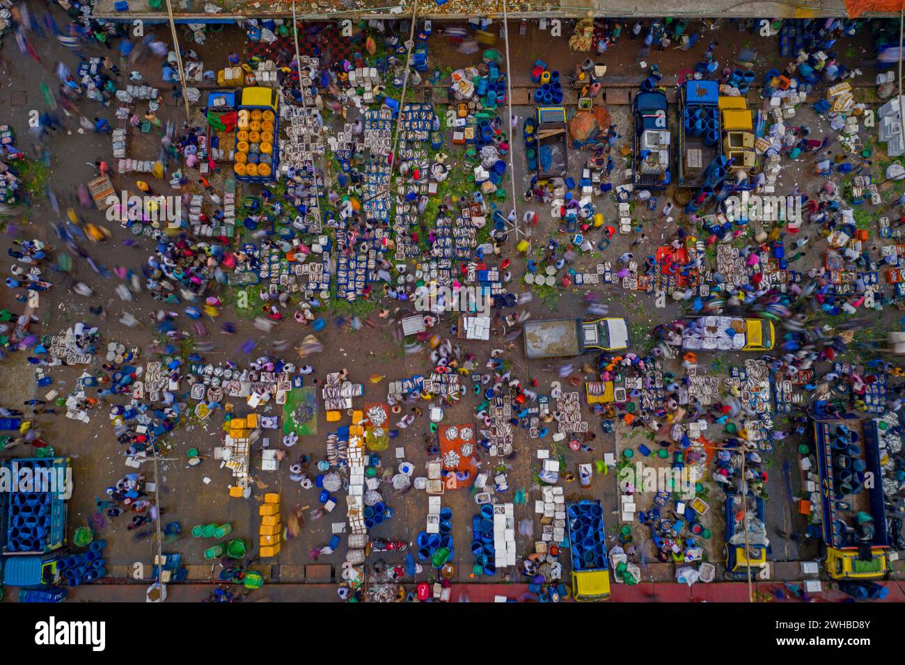 Aerial view of people working and trading at fish market along Karnaphuli river, Chittagong, Bangladesh. Stock Photo