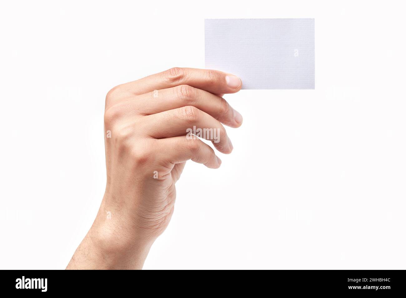 Man hand holding a blank card isolated on a white background Stock Photo