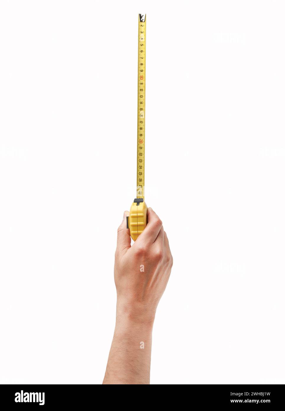 Man hand holding a metallic tape measure isolated on a white background Stock Photo