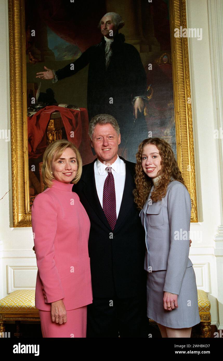 President Bill Clinton, First Lady Hillary Clinton, and daughter Chelsea Clinton pose for photographs in the East Room of the White House - White House Photo January 20, 1997 Stock Photo