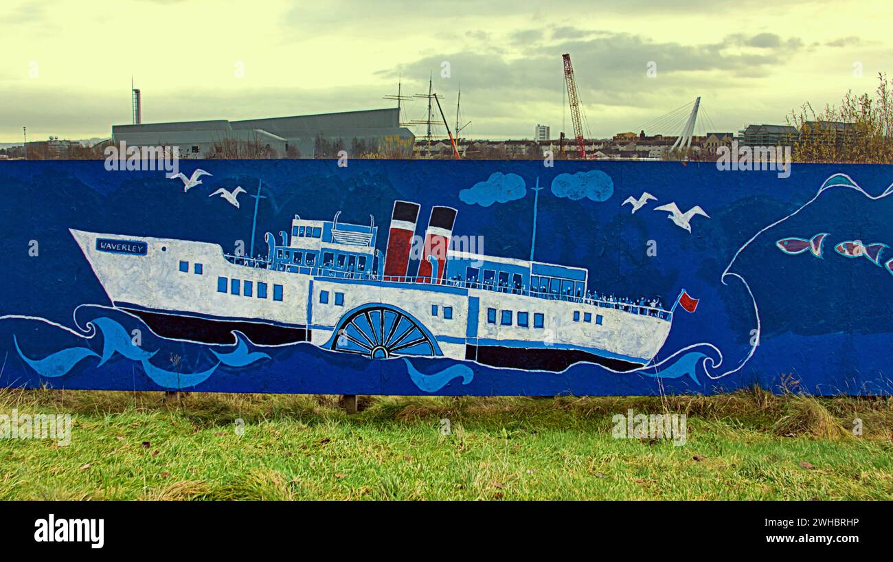 Glasgow, Scotland, UK. 9tht February, 2024.  Cloudy riverside and Dancing wave the longest mural in the city celebrates the heritage of the river clyde and runs along its bank illustrating its sites and history where the paddlesteammer waverley is illustrated. Credit Gerard Ferry/Alamy Live News Stock Photo