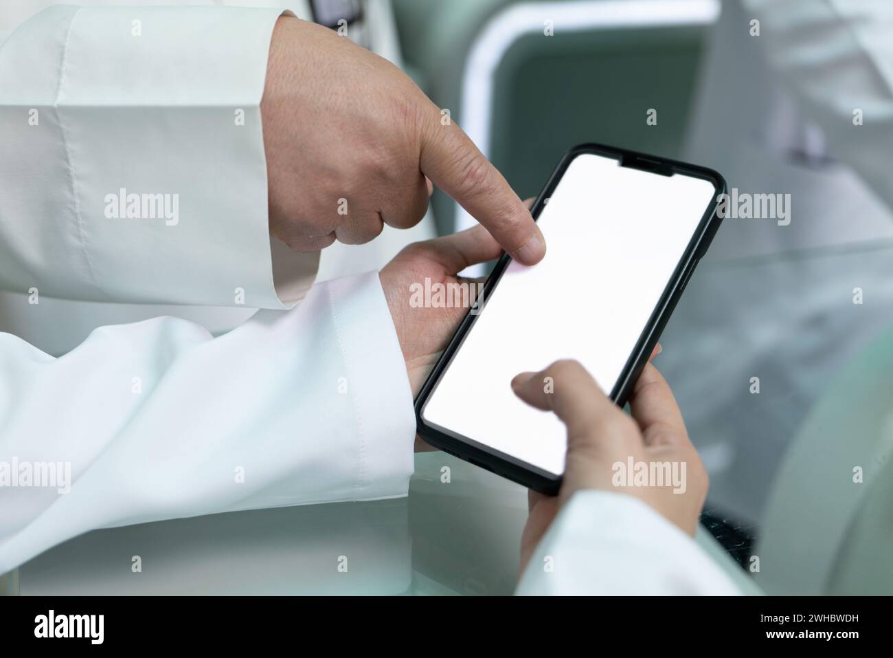 Doctors are pointing on smartphone Stock Photo