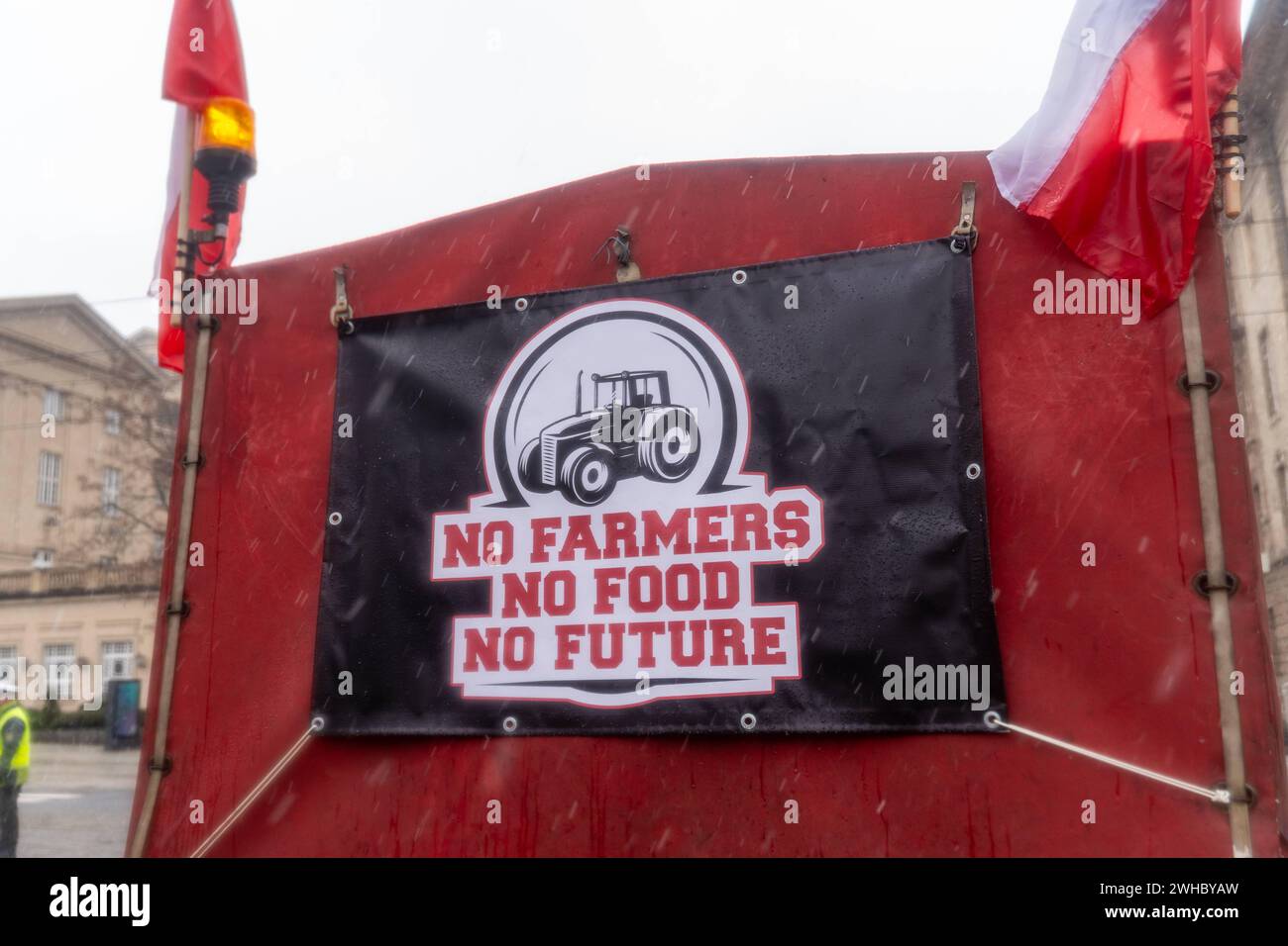 a No farmers no food no future banner is attached to a tractor during a farmers protest during a protest against the flow of agricultural products from Ukraine to the European Union Farmers protest in Poznan, Poland, February 9, 2024 Copyright: xMarekxAntonixIwanczukx MAI05886 Stock Photo