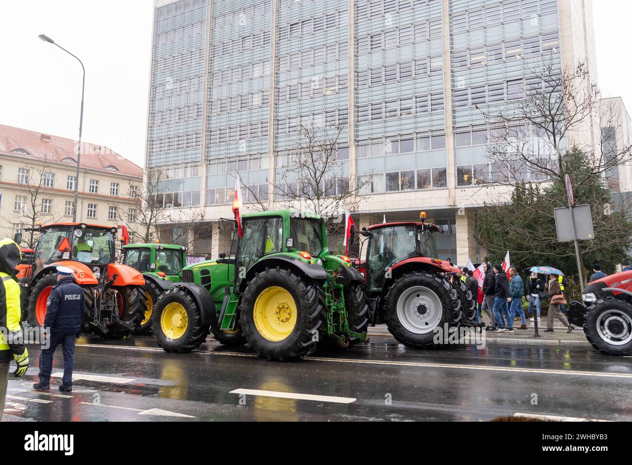 Tractors of Polish farmers slow down traffic in the town Poznan. Around 3k tractors took part in the protest against the inflow of agricultural products into the European Union from Ukraine Farmers protest in Poznan, Poland, February 9, 2024 Copyright: xMarekxAntonixIwanczukx MAI05956 Stock Photo