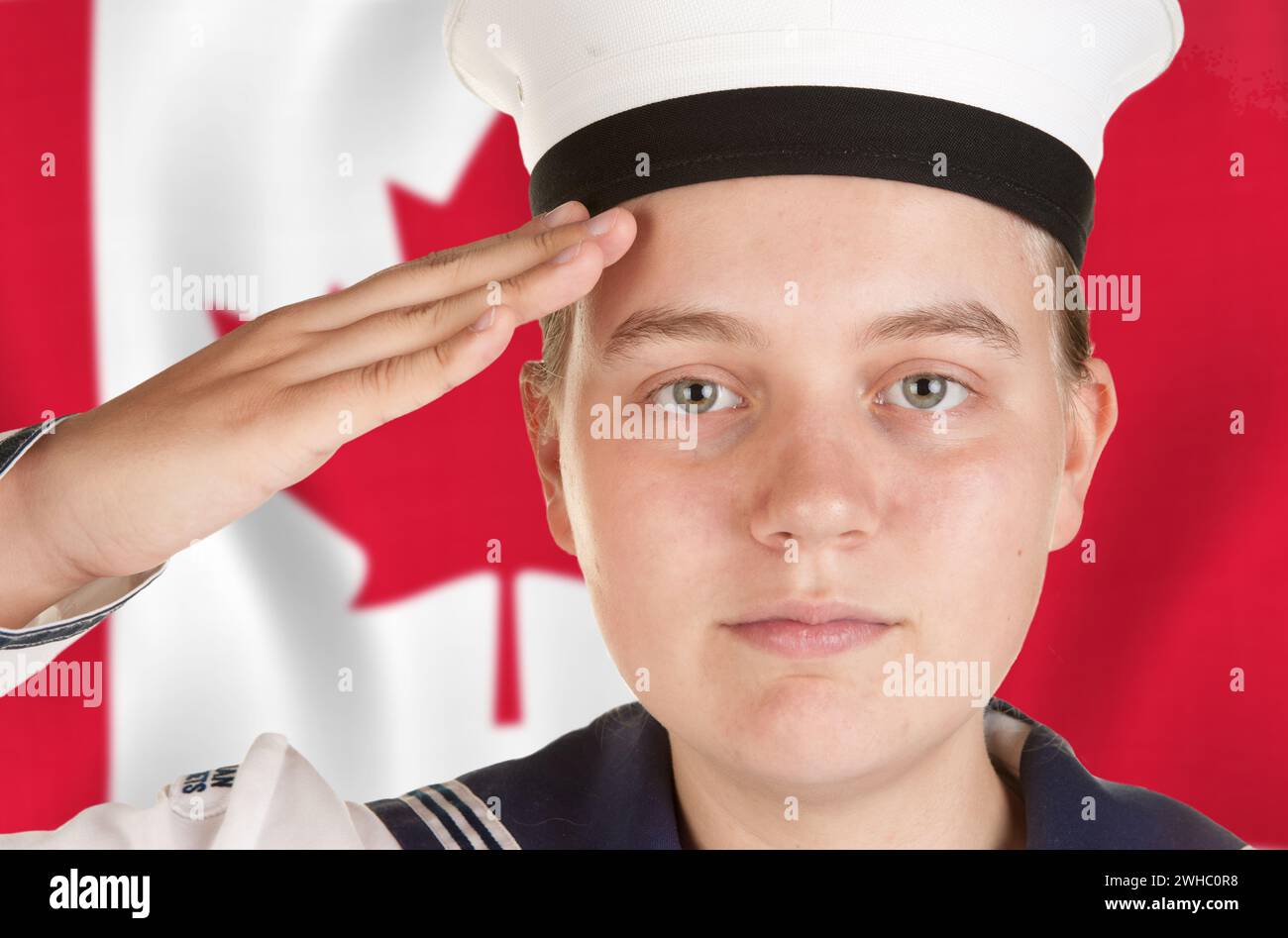 Young sailor saluting isolated white background Stock Photo