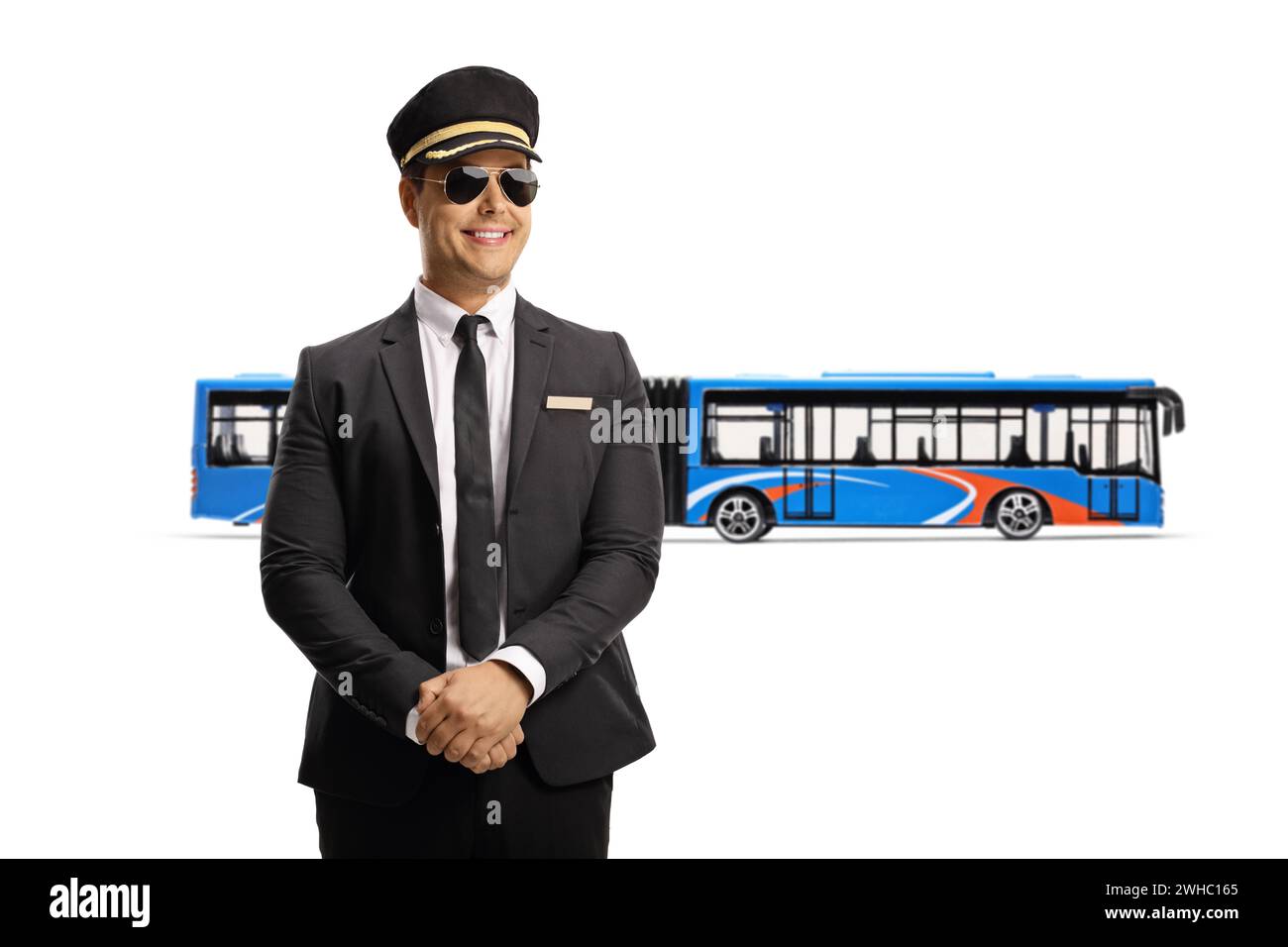 Chauffeur in a uniform in front of a city bus isolated on white background Stock Photo