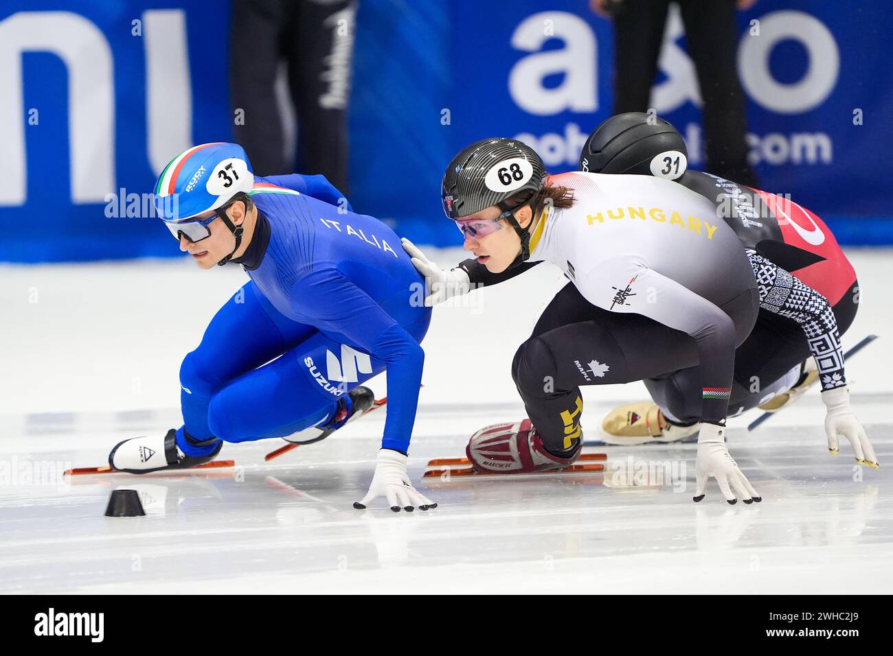 Dresden, Germany. 09th Feb, 2024. DRESDEN, GERMANY - FEBRUARY 9: Luca Spechenhauser of Italy, Balazs Bontovics of Hungary, Furkan Akar of Turkey competing on the Men's 1000m Heats during the ISU World Cup Short Track Speed Skating 5 Dresden at JOYNEXT Arena on February 9, 2024 in Dresden, Germany. (Photo by Andre Weening/Orange Pictures) Credit: Orange Pics BV/Alamy Live News Stock Photo