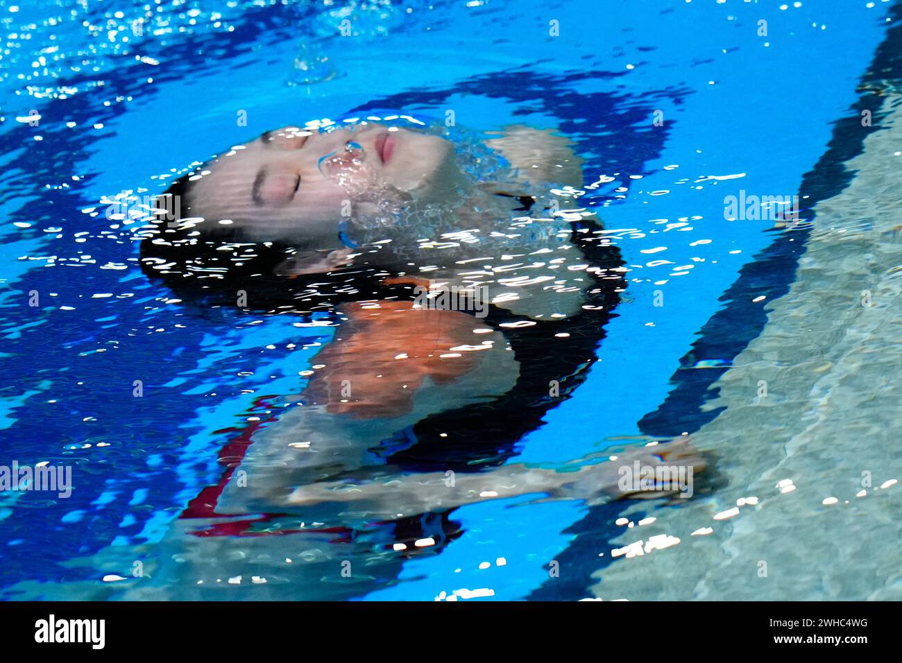 Chang Yani of China emerges from the water after a dive during the