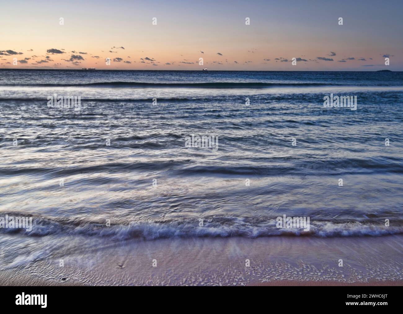 Peaceful waves sunrise hi-res stock photography and images - Alamy