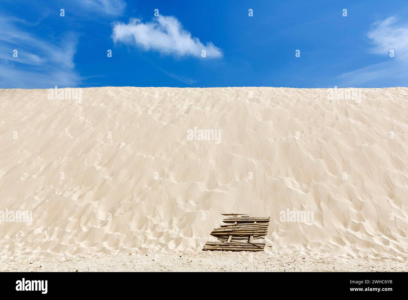 Empty dune, shifting dune, white fine sand, spring clouds, minimalist landscape, symbolic image, coastline, Valdevaqueros, Tarifa, Spain Stock Photo