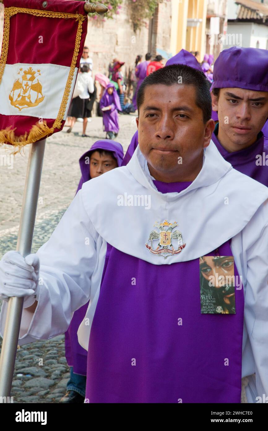 Antigua Guatemala Procession Leader Escorts A Float Anda Through 