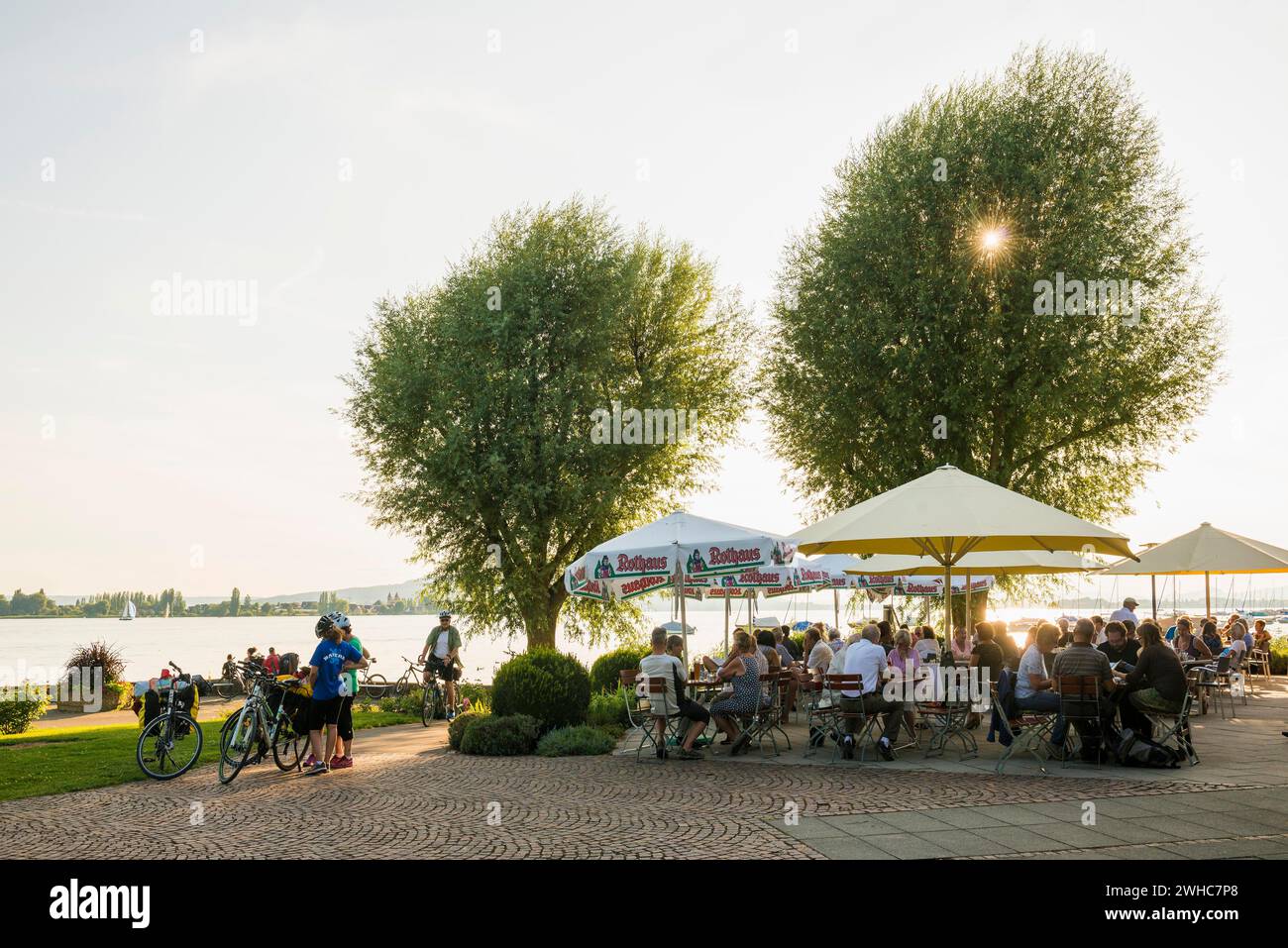 Beer garden and restaurant by the lake, lakeside promenade, Friedrichshafen, Lake Constance, Baden-Wuerttemberg, Germany Stock Photo