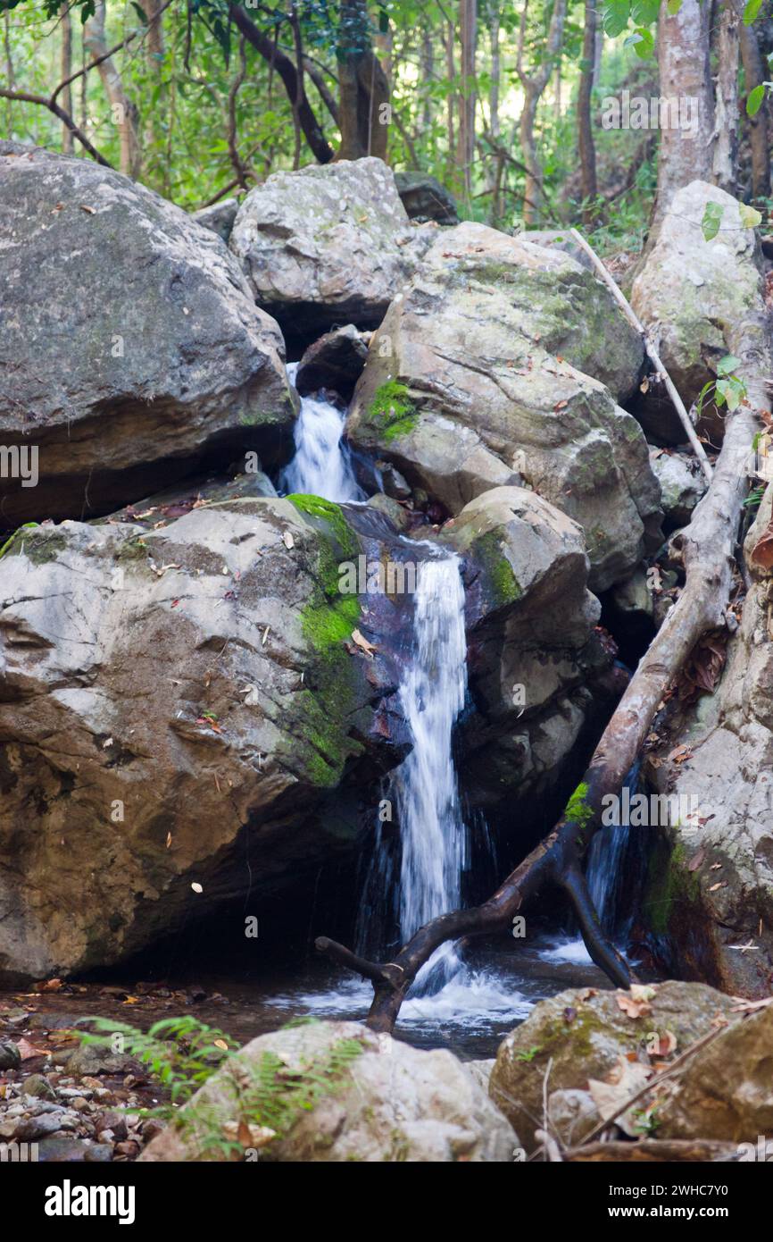 Small waterfall in stream Stock Photo