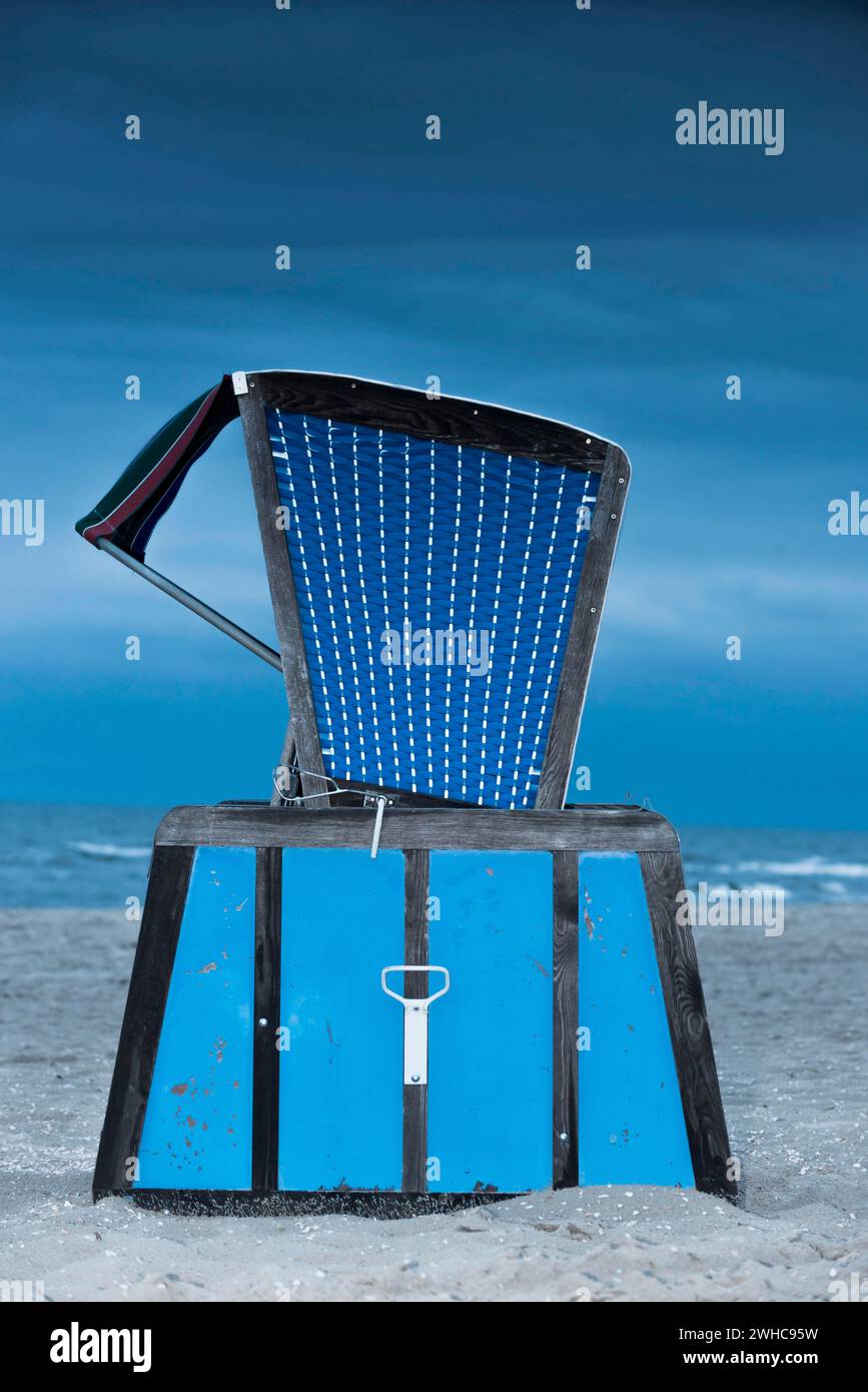 Beach chair on the Baltic Sea coast, beach, empty, nobody, crisis, bad weather, cloudy, cloudy, bad weather, tourism crisis, holiday, beach holiday Stock Photo