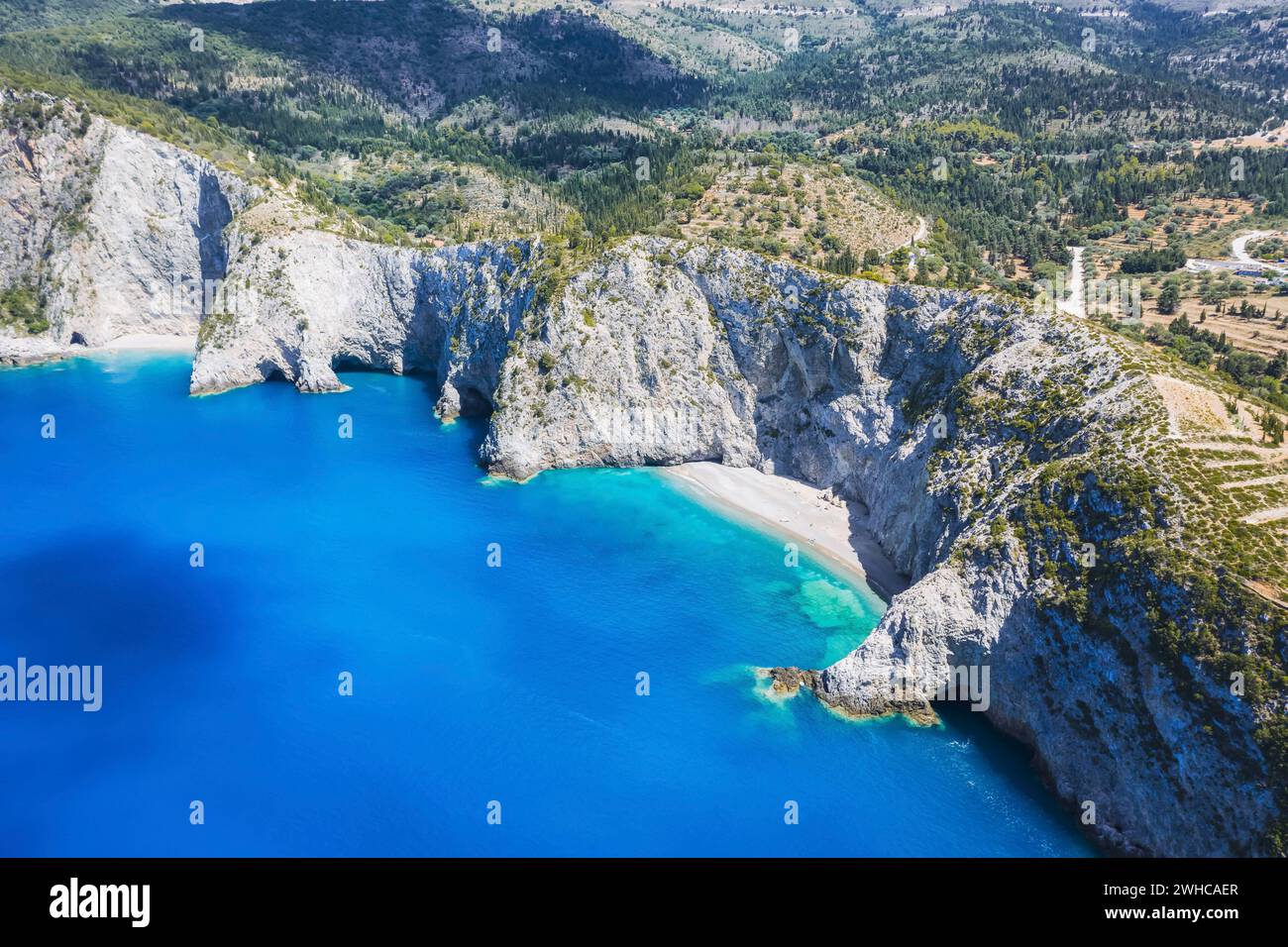 Aerial panoramic view of Assos village coast. Kefalonia island, Greece. Travel summer vocation concept. Stock Photo