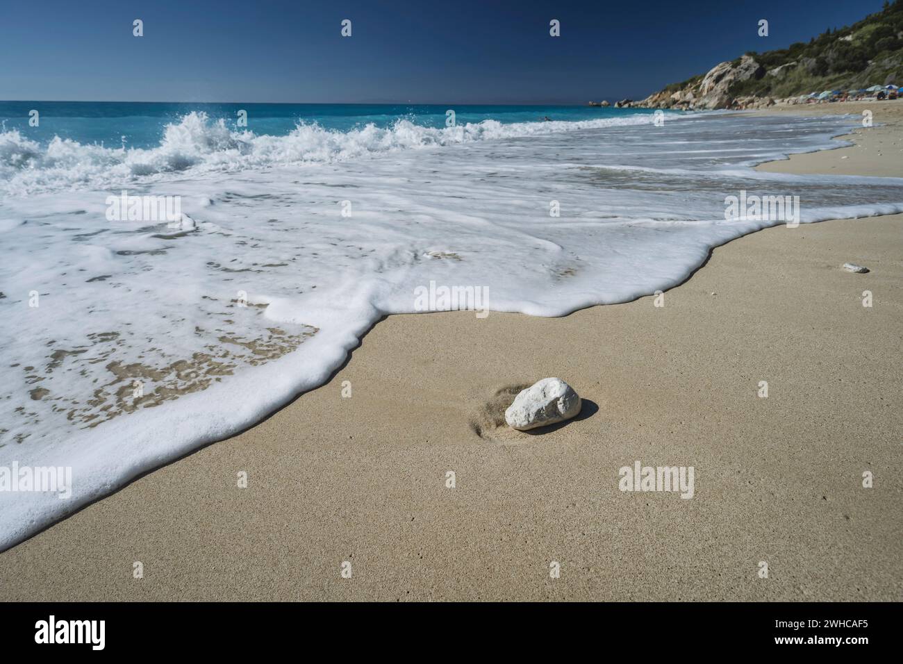 Milos beach near the Agios Nikitas village on Lefkada Ionian island, Greece. Evening sunset golden light. Stock Photo