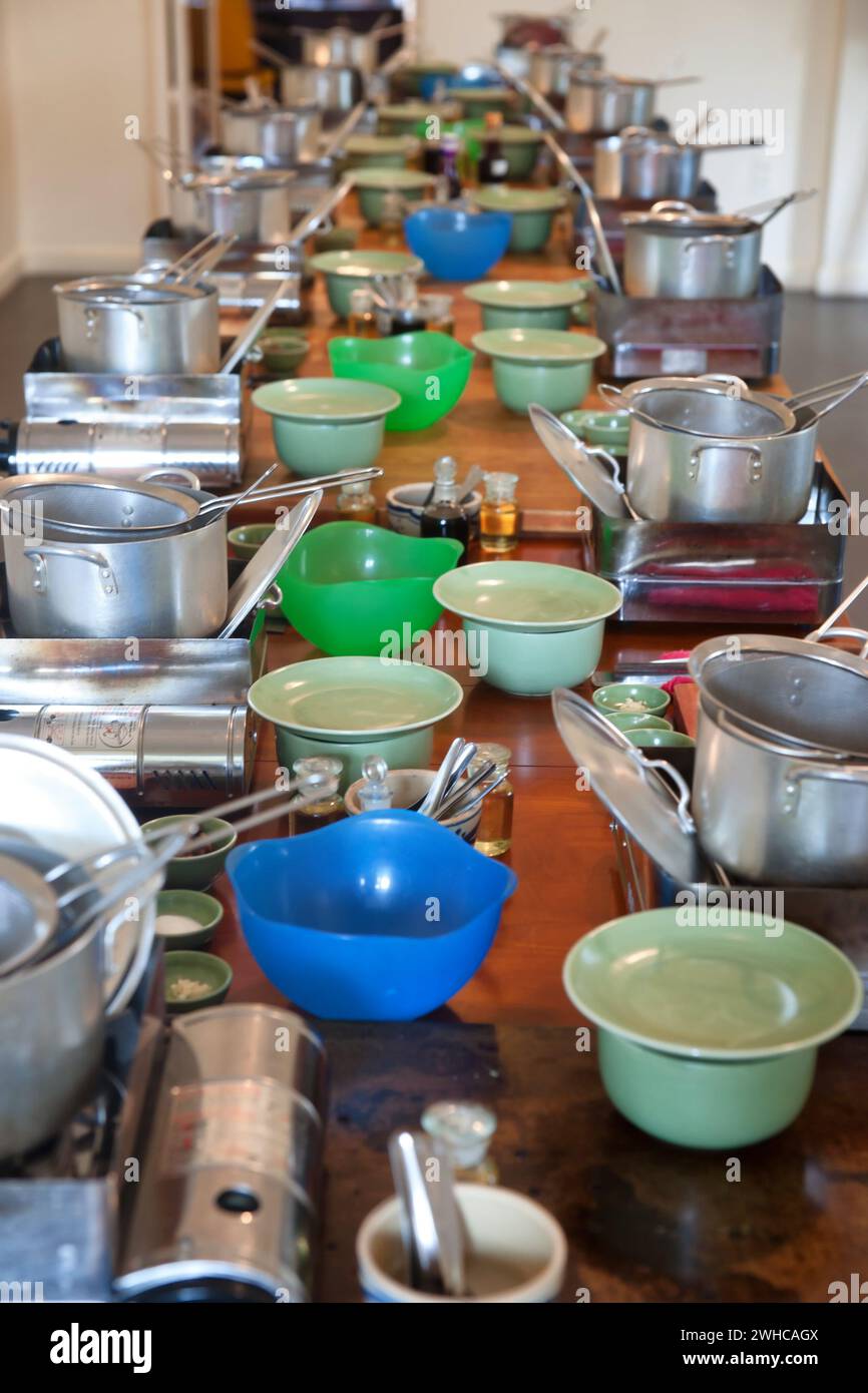 Cookware on long table Stock Photo