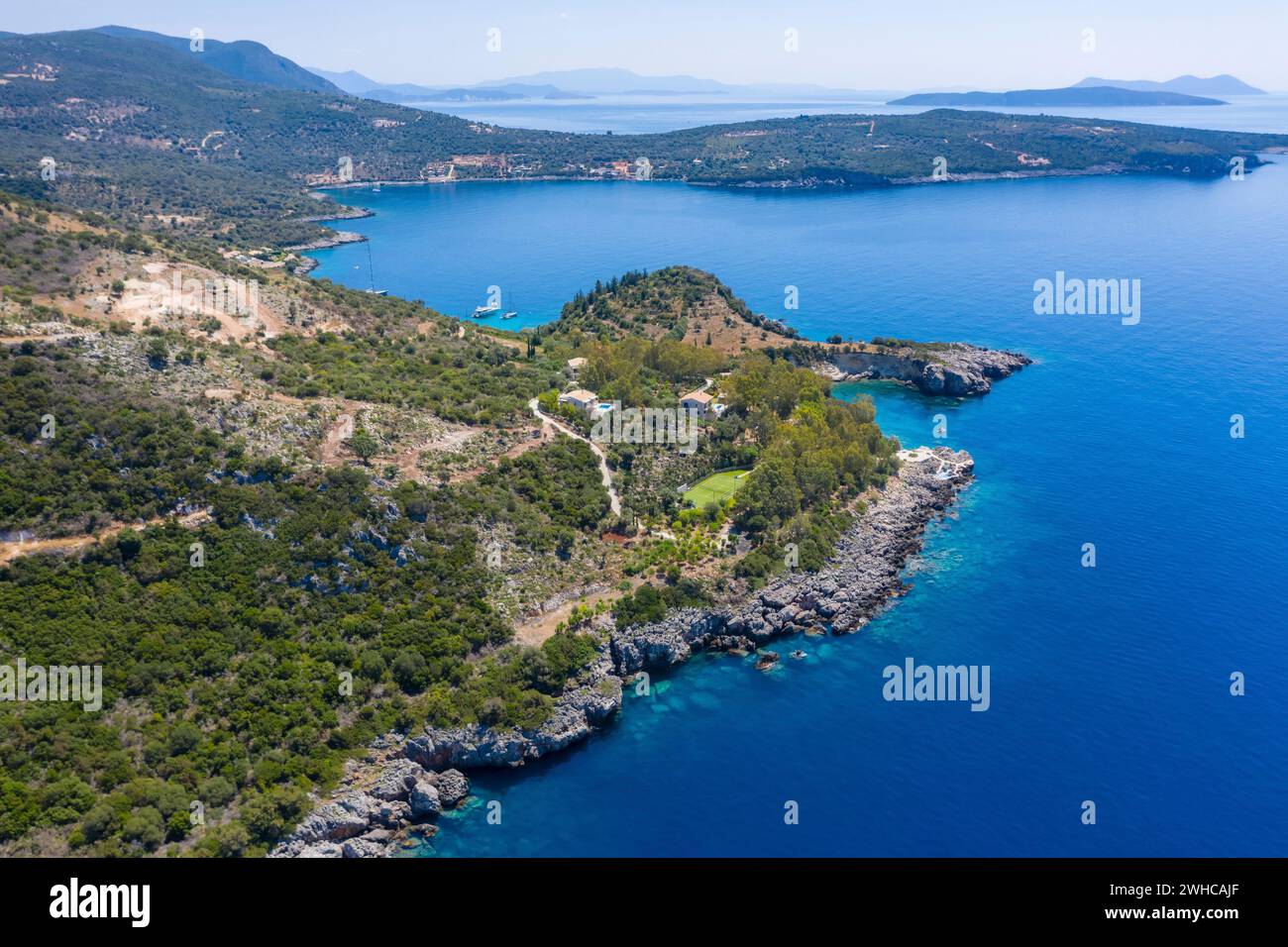 Aerial drone photo of iconic paradise sandy beach of Agiofili near port of Vasiliki. Lefkada island, Ionian, Greece. Stock Photo