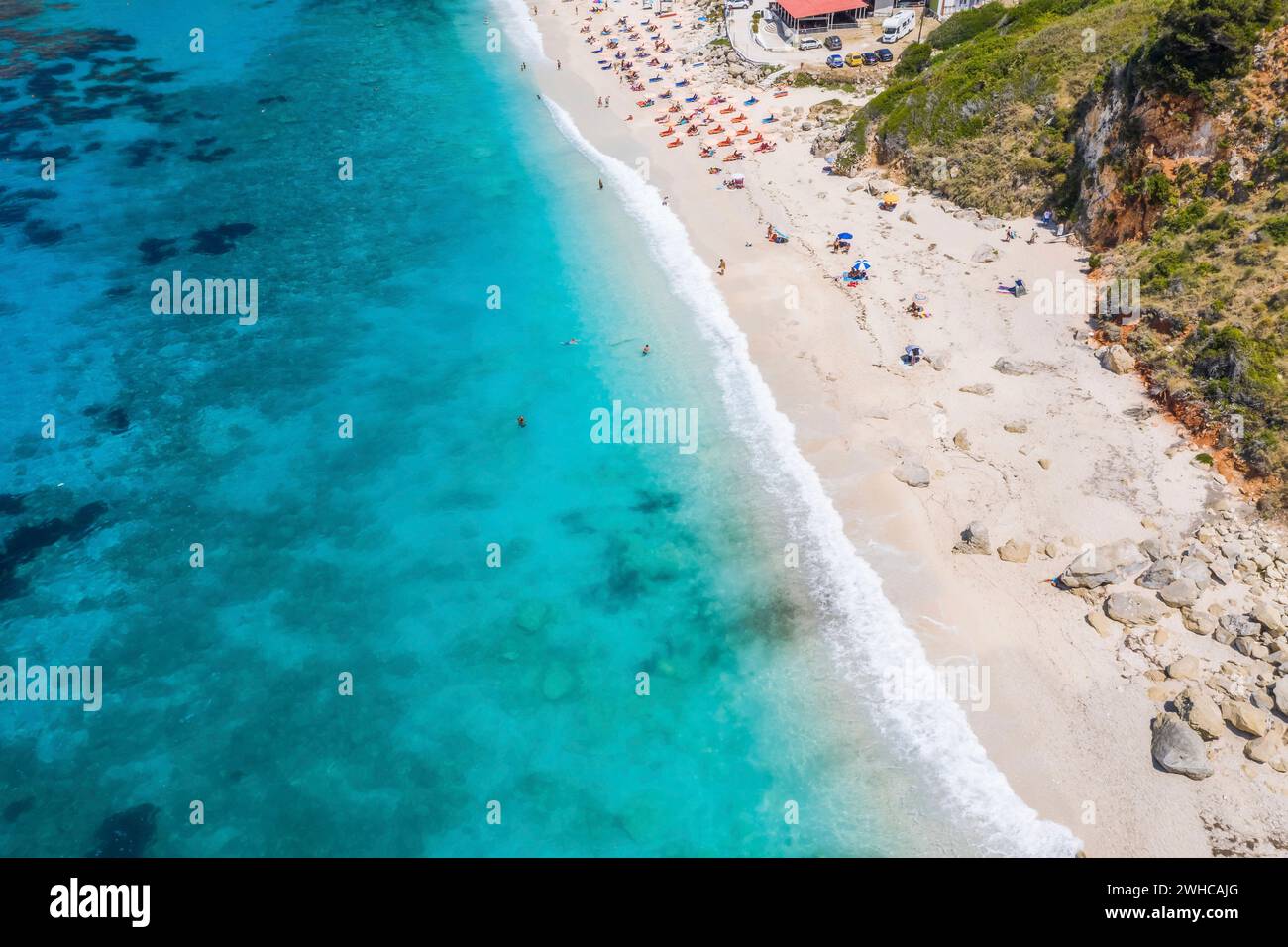 Aerial top down drone photo of Petani beach with beautiful turquoise sea at Cefalonia island, Ionian, Greece. Stock Photo