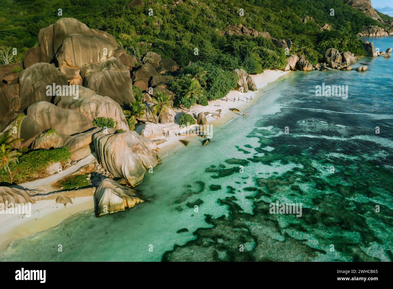 Aerial view of dreamy exotic beach Anse Source d'Argent at La Digue island, Seychelles. Stock Photo