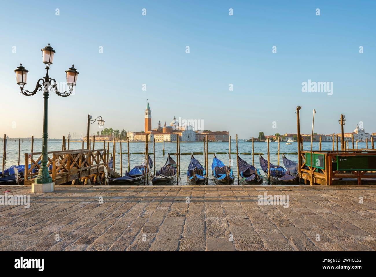 Blue gondolas in water hi-res stock photography and images - Alamy
