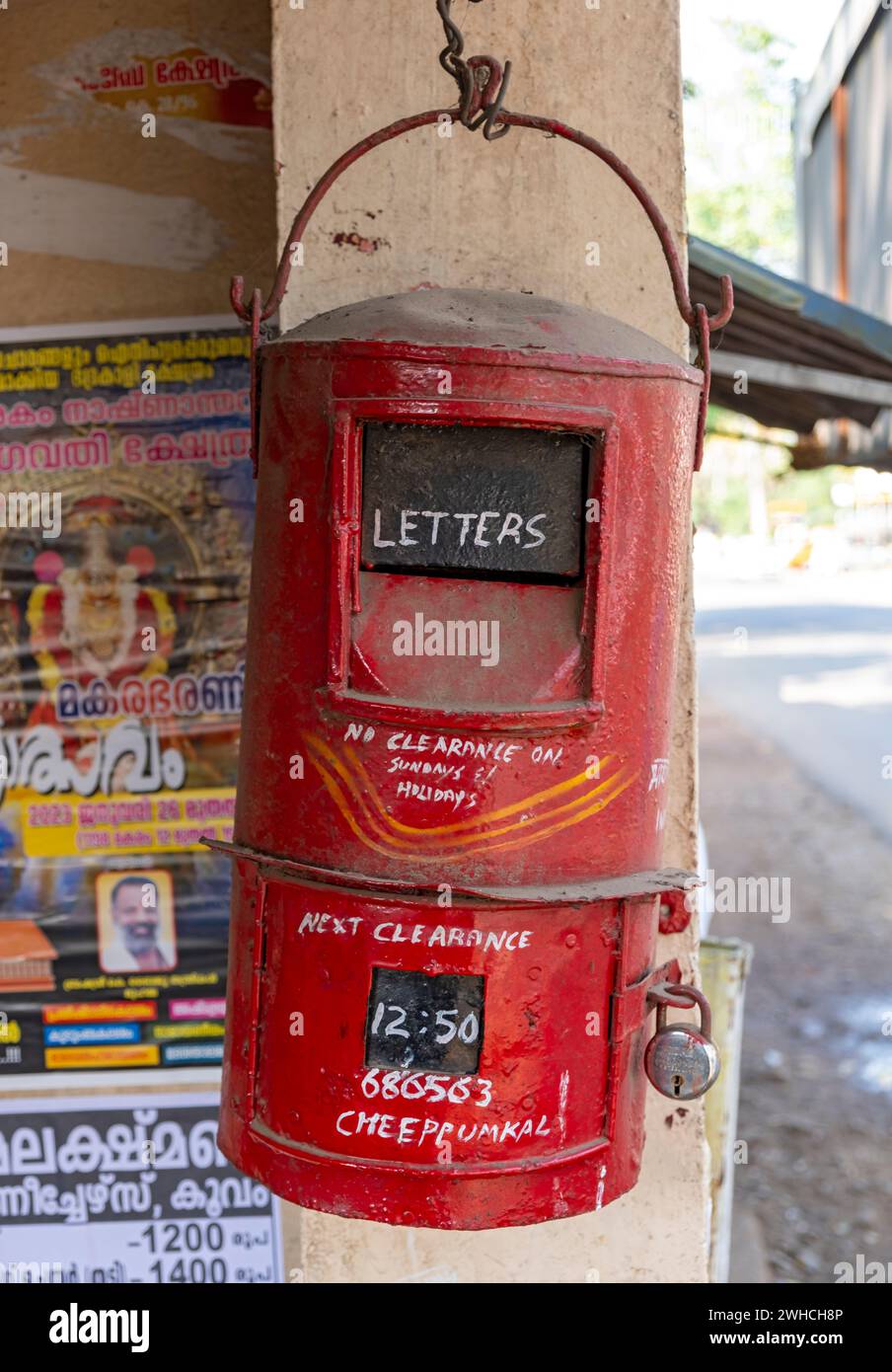 Typical traditional red postbox, Kerala, India Stock Photo