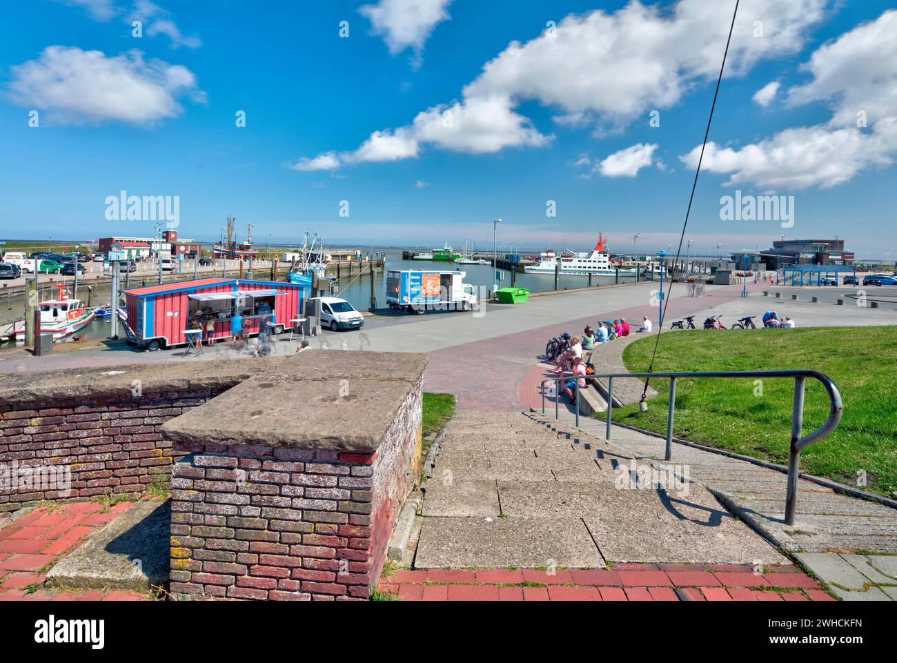 Berth, jetty, Spiekeroog, ferry, harbor, pier, view of town, Neuharlingersiel, East Frisia, North Sea, Germany, Stock Photo