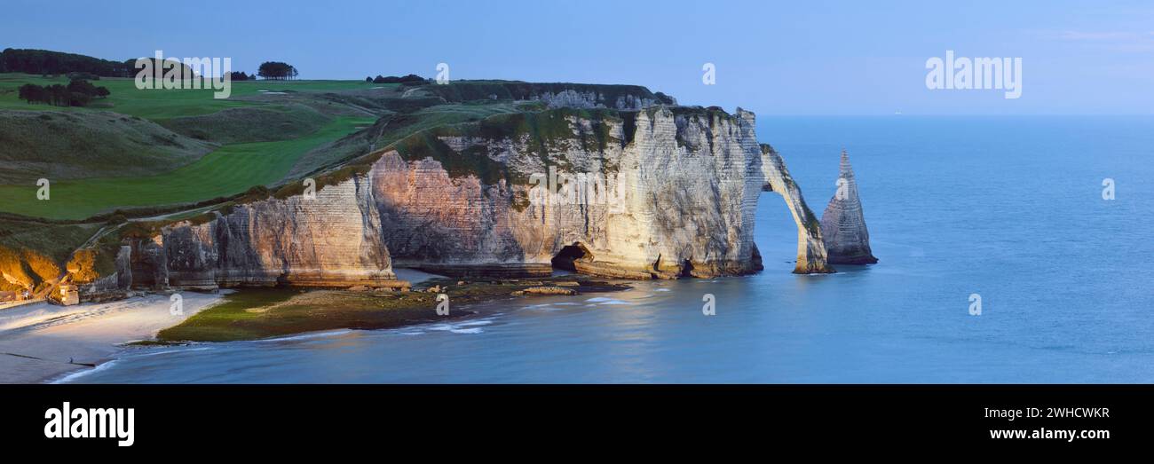 Steep cliffs with the Falaise d'Aval rock gate and the Aiguille ...