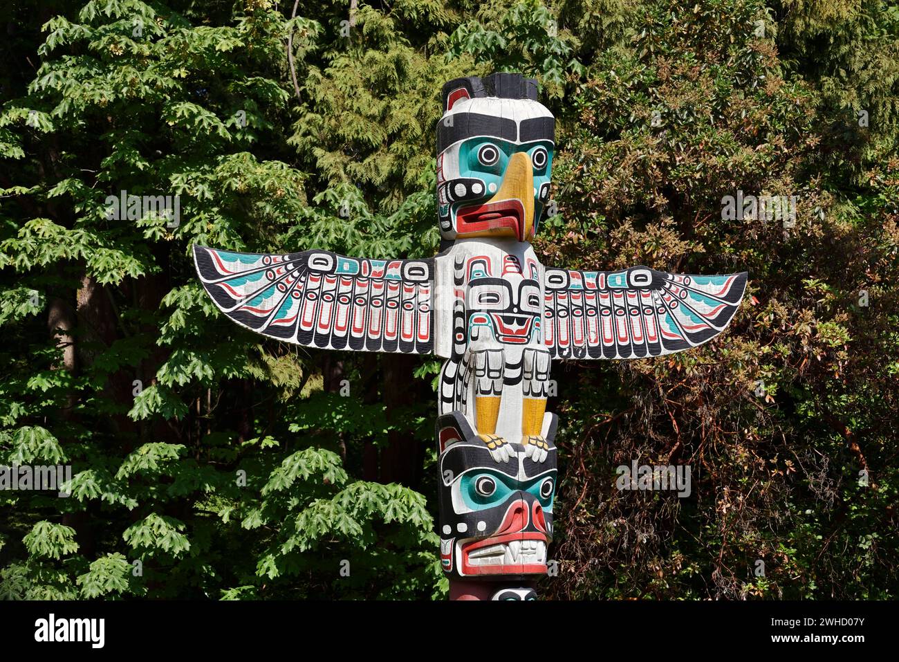 Totem Pole, Thunderbird House Post Totem Pole, Stanley Park, Vancouver, British Columbia, Canada Stock Photo